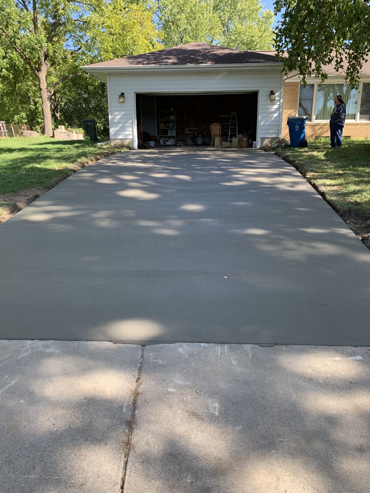 Freshly finished residential concrete flatwork by Legacy General Services